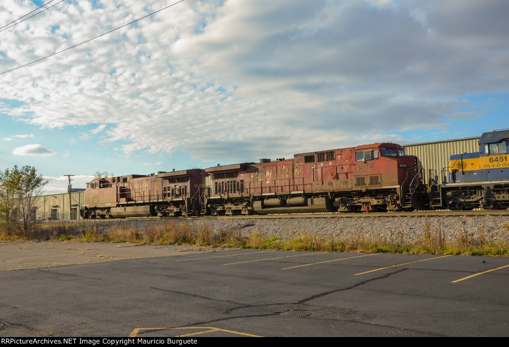 CP AC44CW Locomotives leading a train